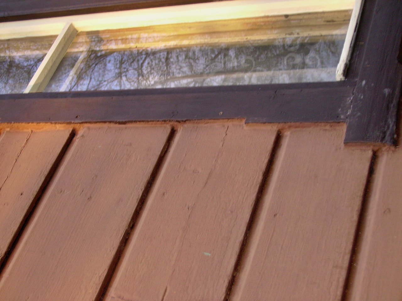 Renovace nátěru dřevěného domu