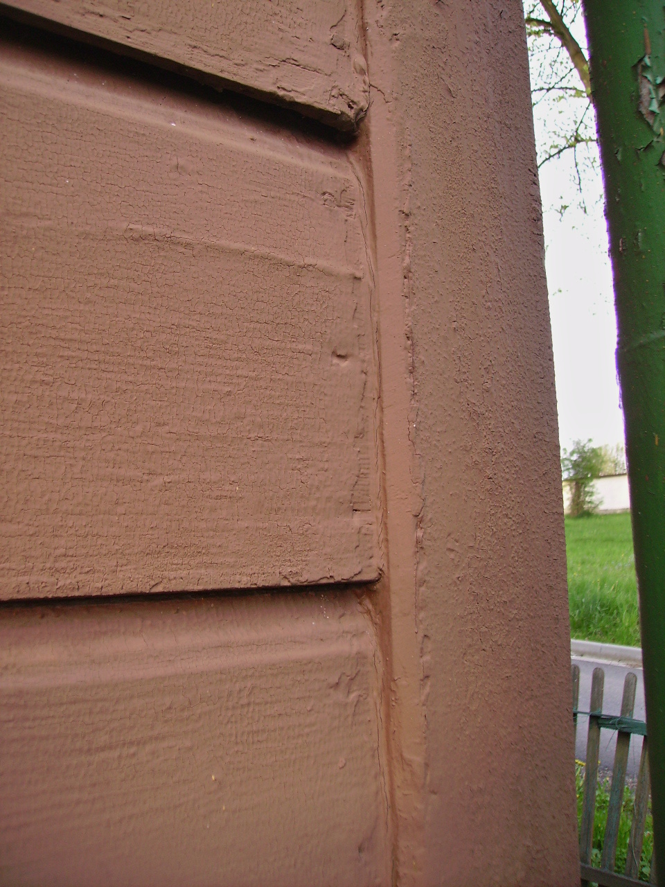 Renovace nátěru dřevěného domu